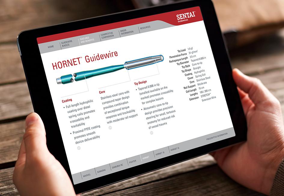 Close up teaser image of two hands holding an iPad showing an interior page of the SENTAI guidewire app, designed by Carolyn Porter of Porterfolio, Inc. for Boston Scientific